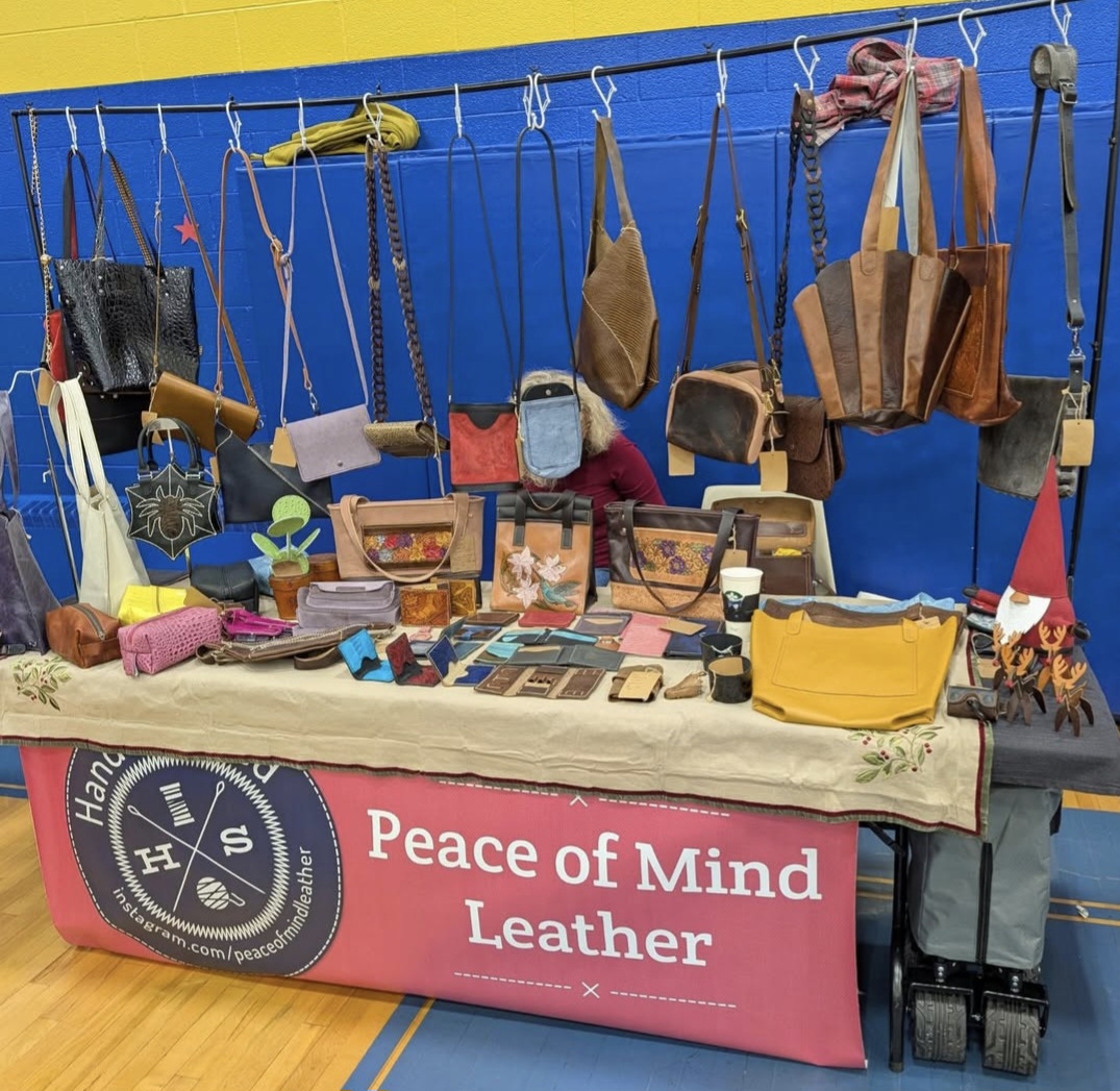 Peace of Mind Leather handmade leather bags on display at pop-up event
